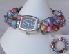 klocka med mnga mini-snckskalsprlor X 2.JPG
